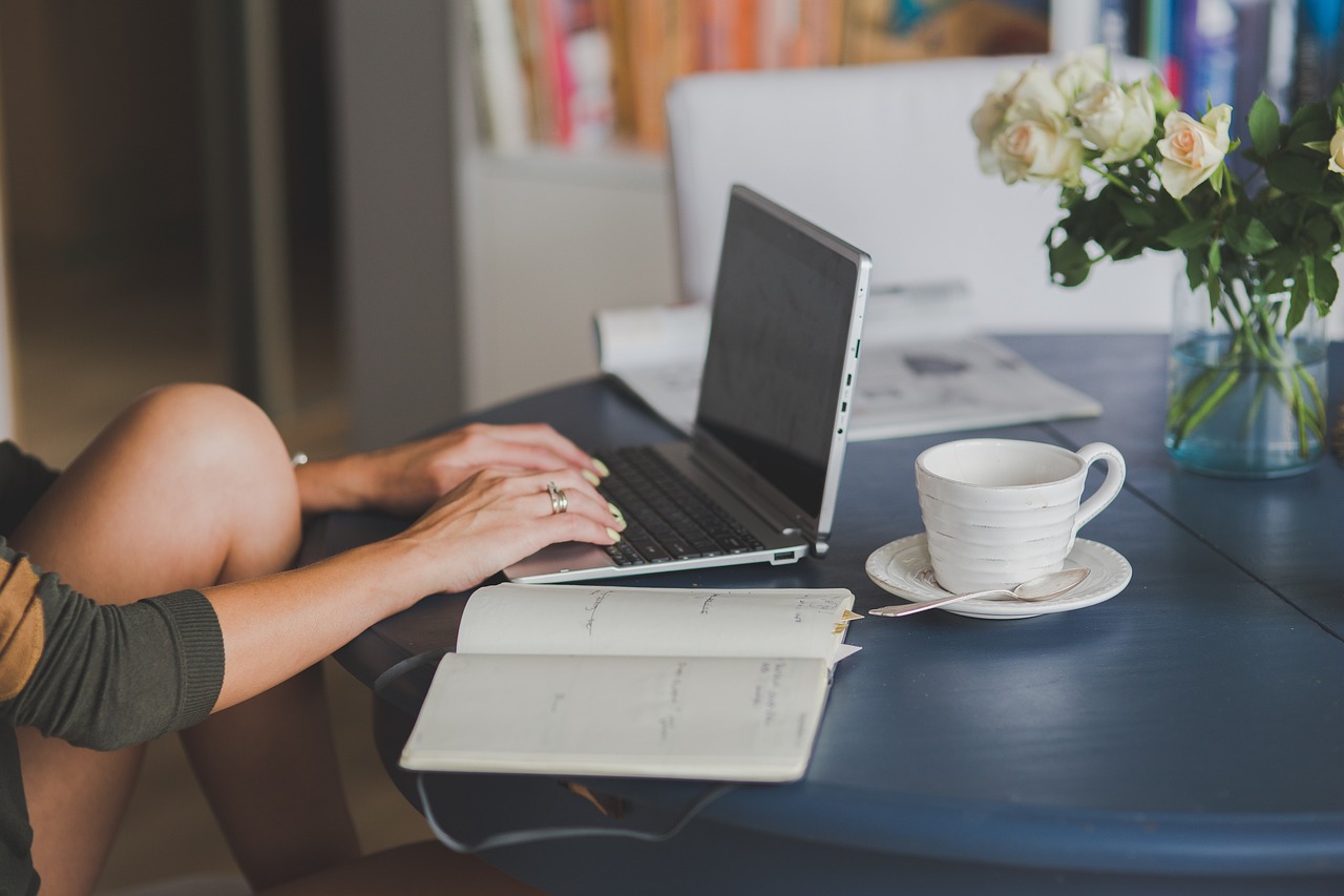Laptop, workstaion, office — Building Wealth in the Digital Age with AI Technology